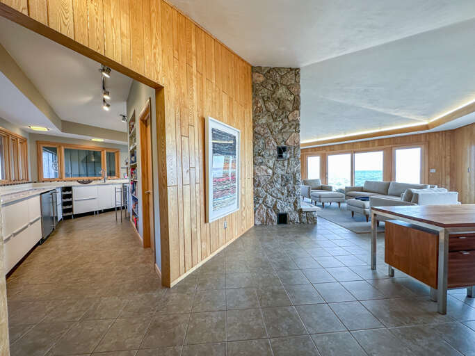 Living room looking into the kitchen.