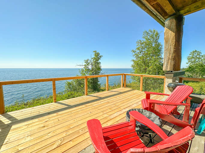 The lake facing deck has seasonal deck seating.