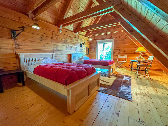 The loft bedroom has two twin beds.