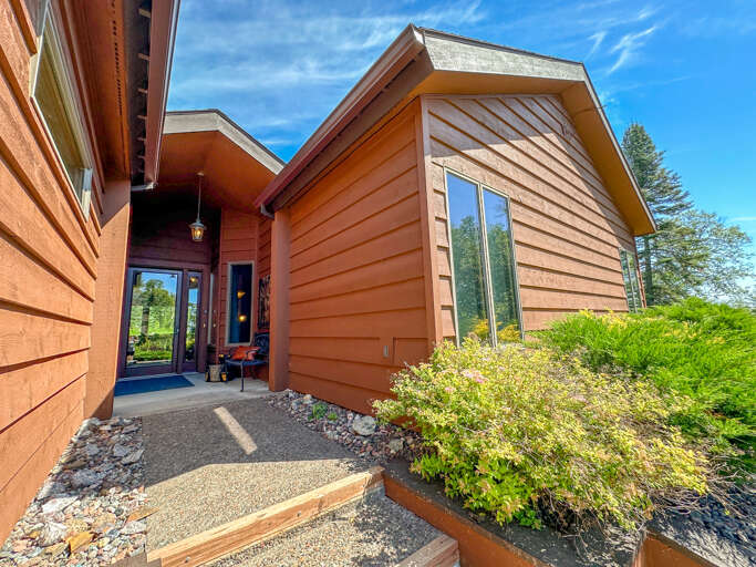 Enter the home through the front door.