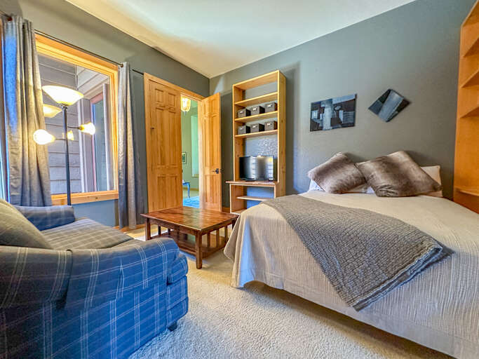 This room has a queen bed and full sized sleeper sofa.