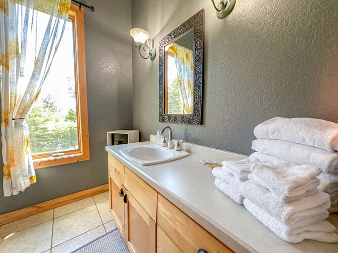 Bathroom 2 is located near Bedrooms 2, 3, and 4.