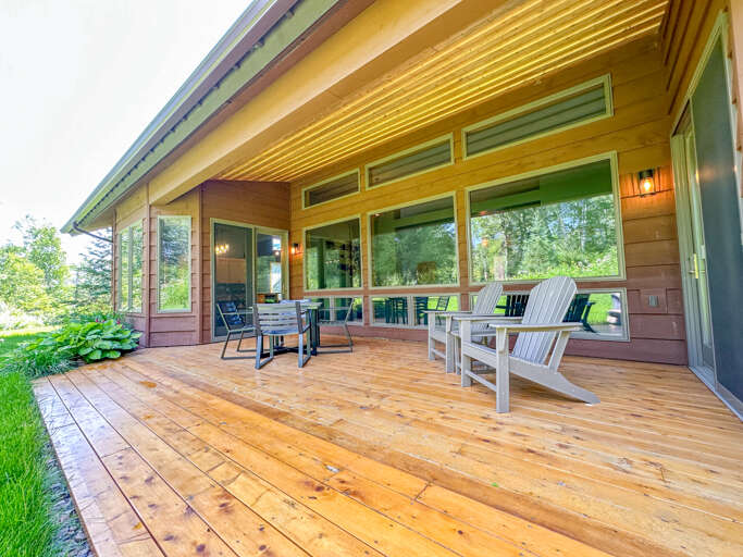 The patio is accessible from the dining area and Bedroom 1.