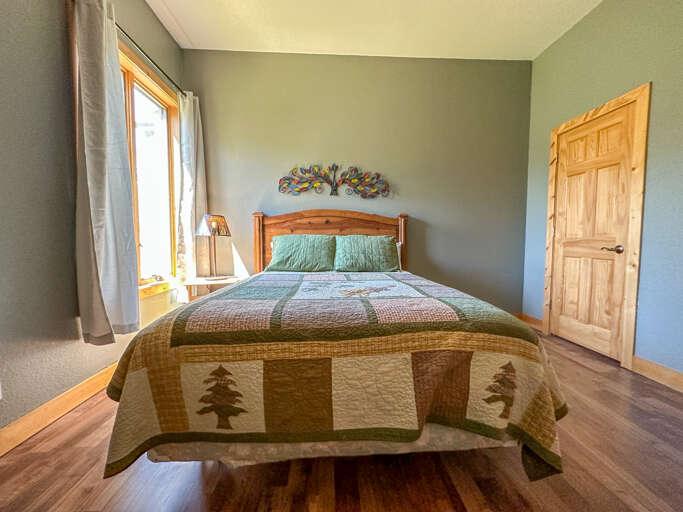 Bedroom 3 has a queen bed.