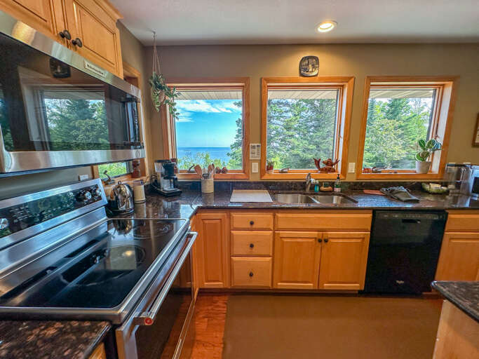 With Lake Superior and Five Mile Rock views!