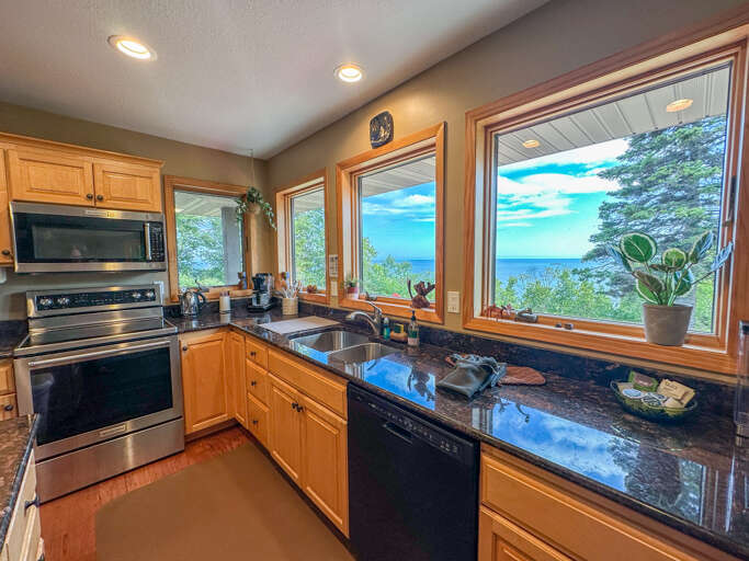 The large windows provide lovely views of Lake Superior and Five Mile Rock.