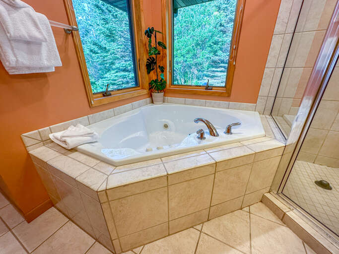 Jetted tub in bathroom 1.