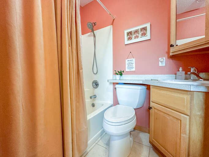 Bathroom 2 has a shower/tub combo.