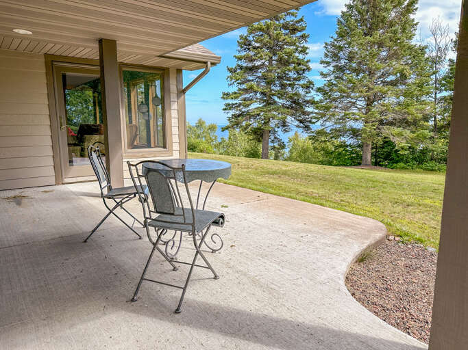 You can enjoy peek-a-boo views of Lake Superior from this patio.