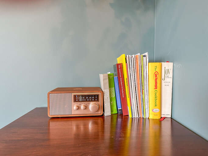 Radio and a small selection of books.