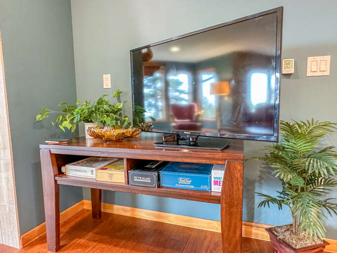 Smart TV and small selection of board games you can enjoy during your stay.