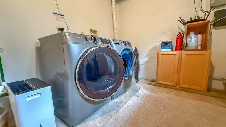 Your vacation laundry is handled with ease in this dedicated laundry space, complete with modern front-loading washer and dryer, so you can pack light and refresh as needed.