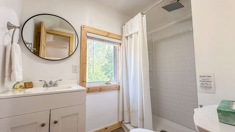 Bathroom 2 is located on the upper level.