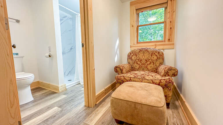 Sitting area and bathroom attached to Bedroom 1.