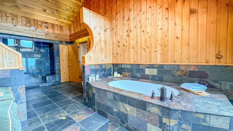 Jetted tub in Bathroom 1.