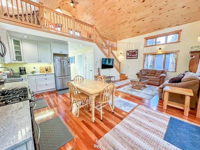 The open living area with the loft above.