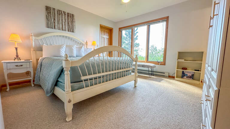 Bedroom 1 has a queen bed and an attached bathroom.