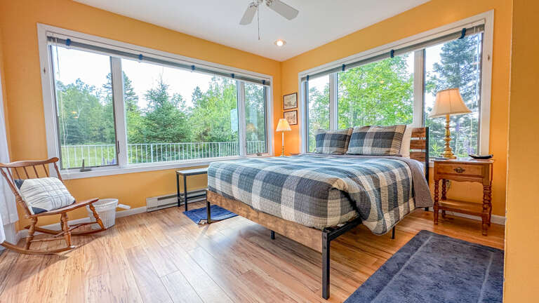 Bedroom 3 has a Queen bed and attached deck.