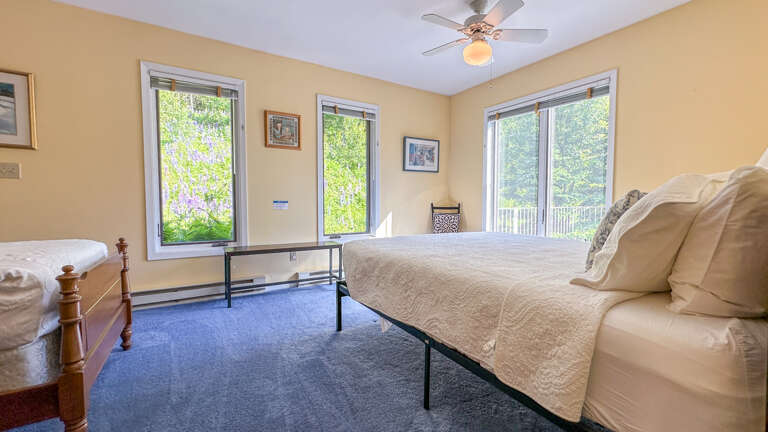 Bedroom 2 has a queen and twin bed.
