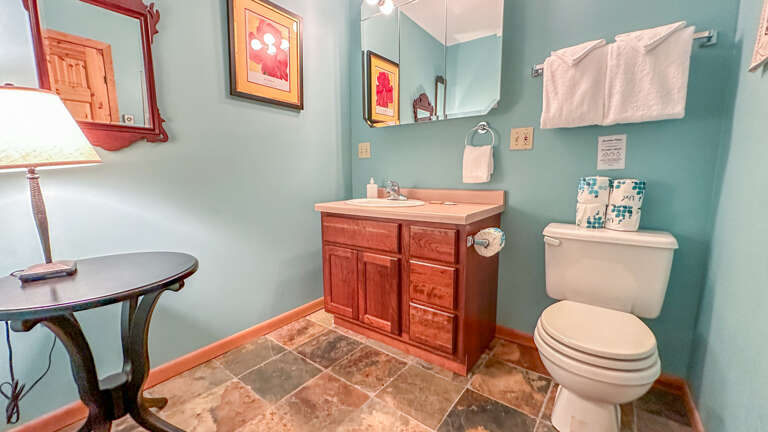 Bathroom 3 is a half bathroom located off the entryway.