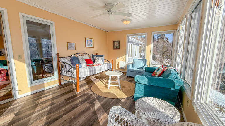 The sunroom is open year round and is available as an additional sleeping area.
