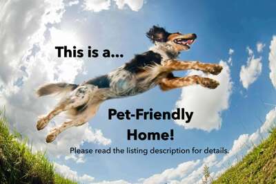 A cheerful welcome for pet-friendly accommodations with open skies and outdoor space awaiting your four-legged companion.