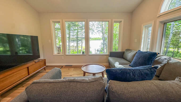 Enjoy Devil Track Lake views from most rooms in the home.