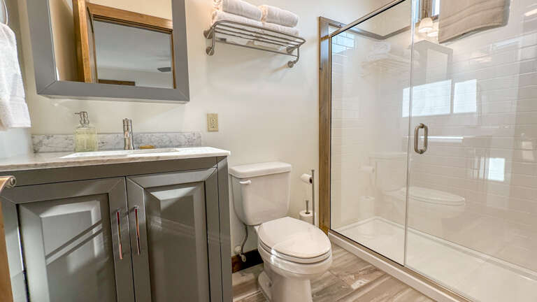 Bathroom 1 is attached to Bedroom 1 and has a walk-in shower. Bathroom 1 is attached to Bedroom 1 and has a walk-in shower.
