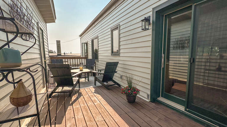 The back deck area is perfect for enjoying the outdoors. The back deck area is perfect for enjoying the outdoors.