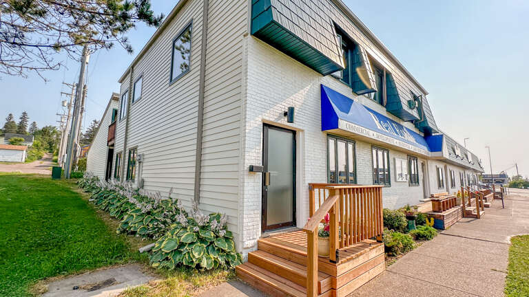 The rental is located above a commercial property.