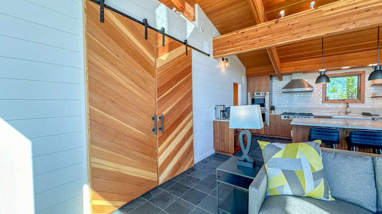 Closed barn doors to Bedroom 1.