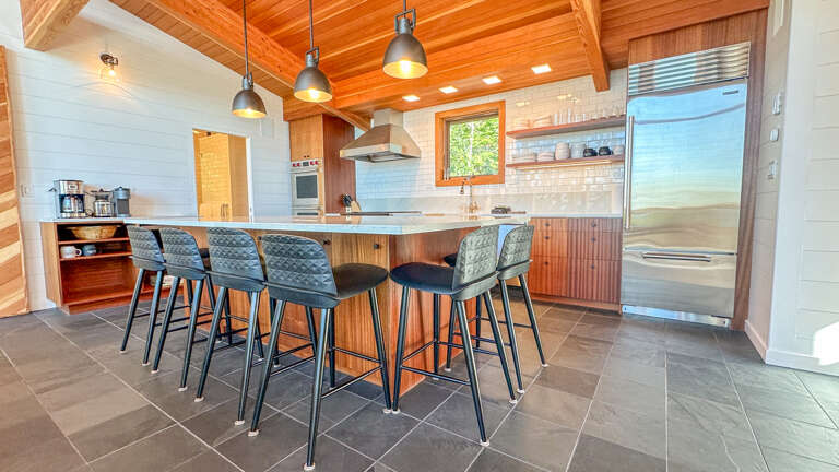Seating for five around the spacious kitchen island.
