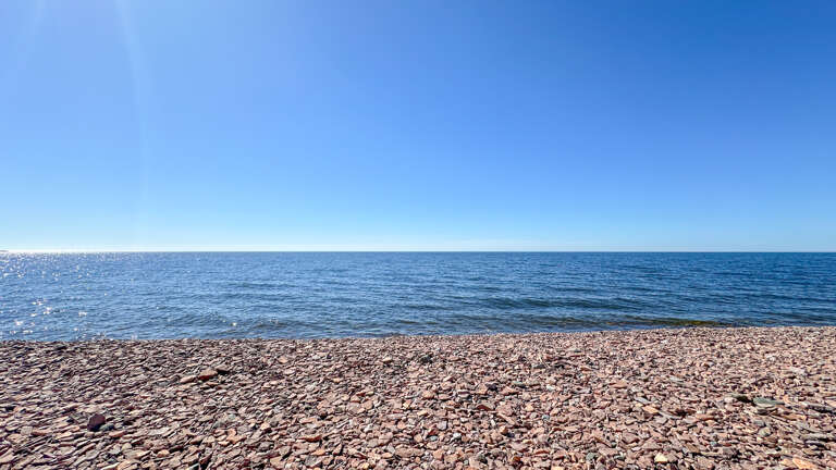 Enjoy 175' of private Lake Superior shoreline.