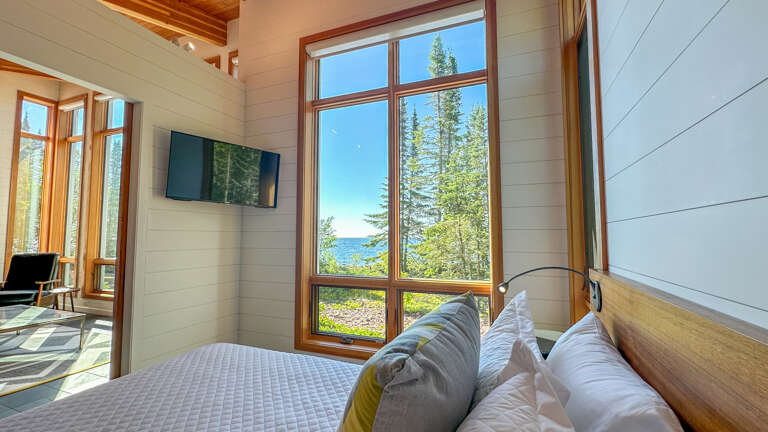TV and view of Lake Superior in Bedroom 1.