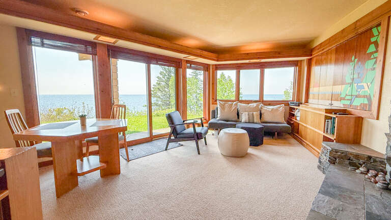 The living room and dining room take full advantage of the Lake Superior views. The living room and dining room take full advantage of the Lake Superior views.