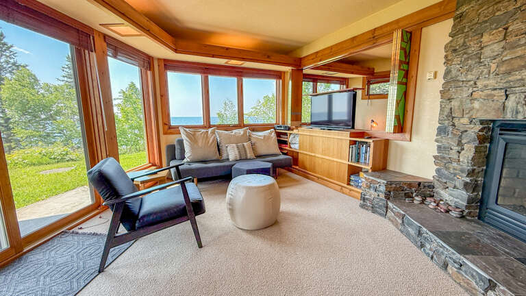 The living room with the hidden TV up and facing the living room. The living room with the hidden TV up and facing the living room.