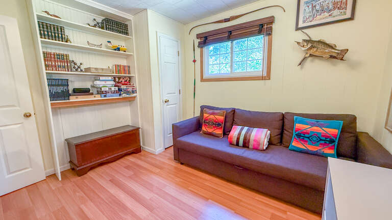 Second sleeping area with sleeper sofa.