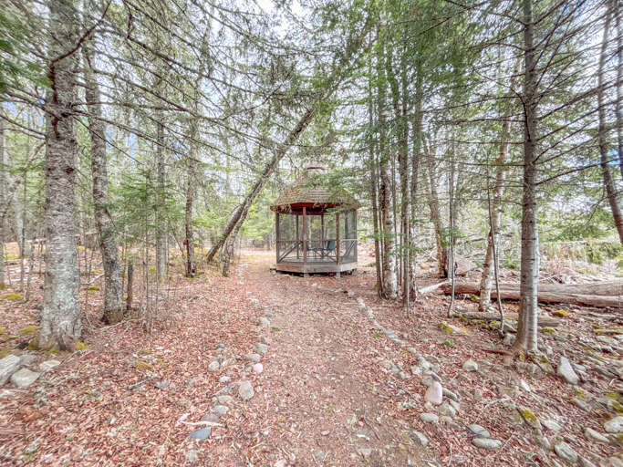 Walkway to the screened in gazebo.