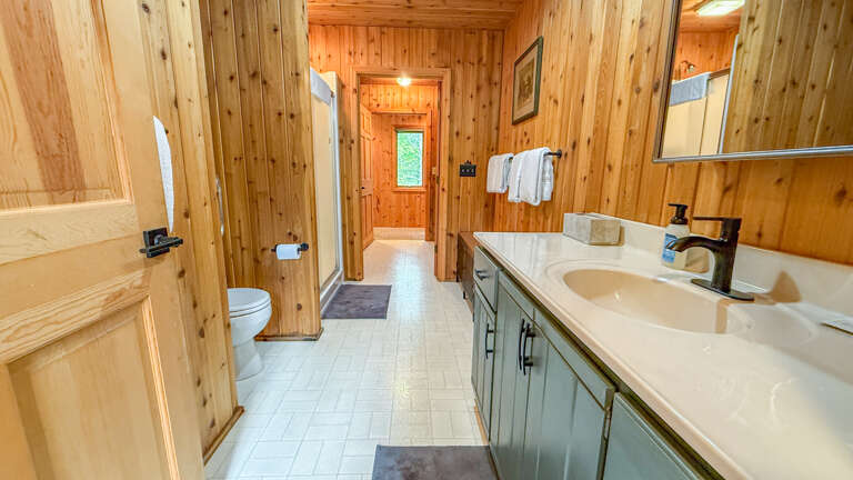 Bathroom with walk-in shower.