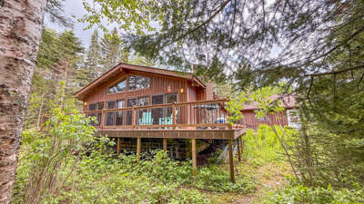 Escape to Pine and Pebble, a cozy and classic Northwoods cabin nestled on the stunning shoreline of Lake Superior not far from the village of Hovland, Minnesota. Escape to Pine and Pebble, a cozy and classic Northwoods cabin nestled on the stunning shoreline of Lake Superior not far from the village of Hovland, Minnesota.
