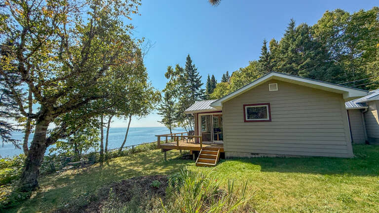 This cozy 1 bedroom cabin sits on a cliff's edge overlooking Lake Superior.