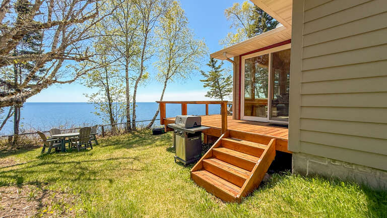 Step onto your private deck with stunning lake views, ready for morning coffee or evening BBQ as fresh breezes and natural beauty surround you.