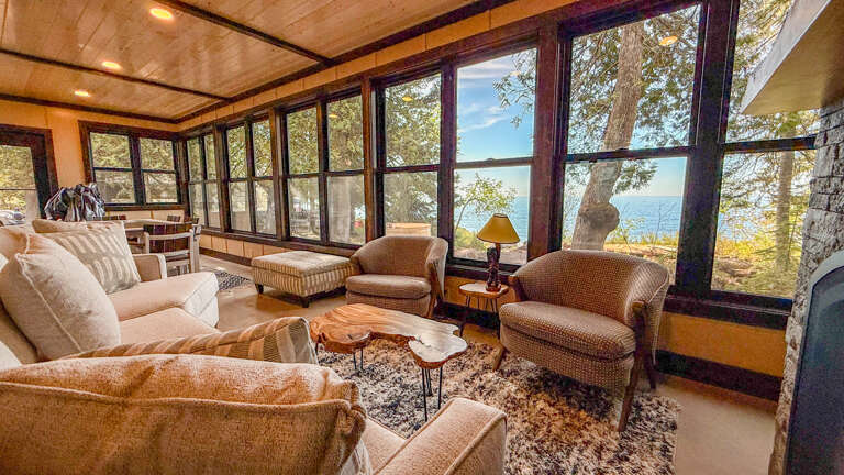 This beautiful home sits just steps away from the Lake Superior shoreline.