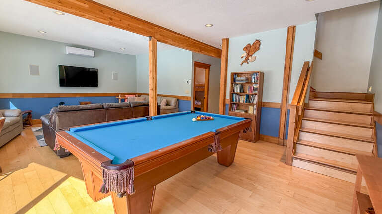 Challenge friends to pool while you unwind in the lower level living room.