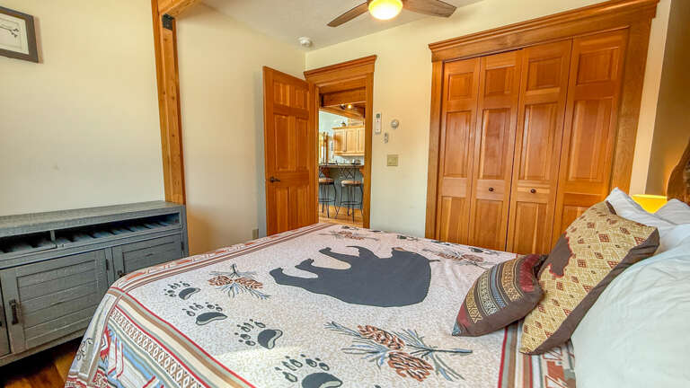 The main floor bedroom is located off of the Great Room.