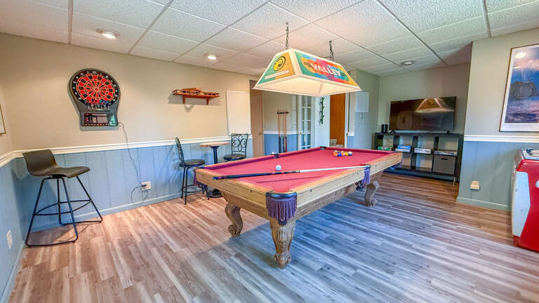 Step into your own game room where billiards, darts, and endless entertainment await your downtime between adventures.