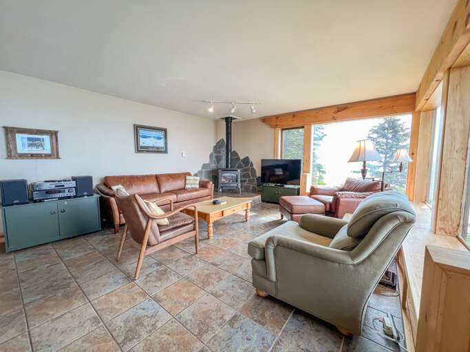 Warm up by the gas fireplace and enjoy a movie with the family. Warm up by the gas fireplace and enjoy a movie with the family.