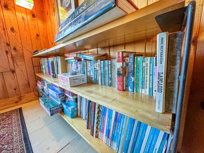A selection of books and games to enjoy during your stay.