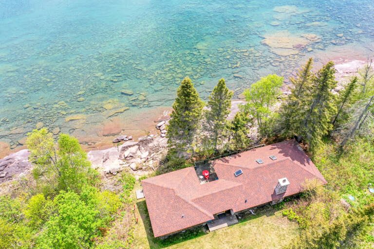 The home sits just steps away from Lake Superior.