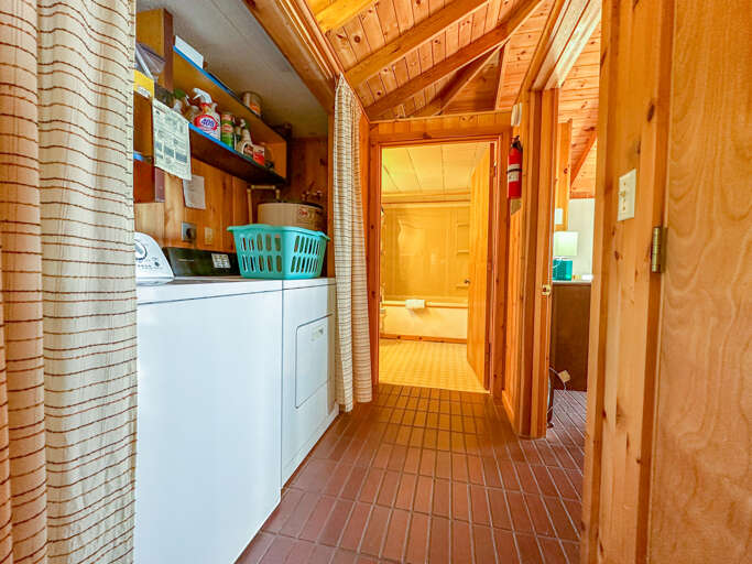 Laundry area near Bedroom 1 and Bathroom 1.
